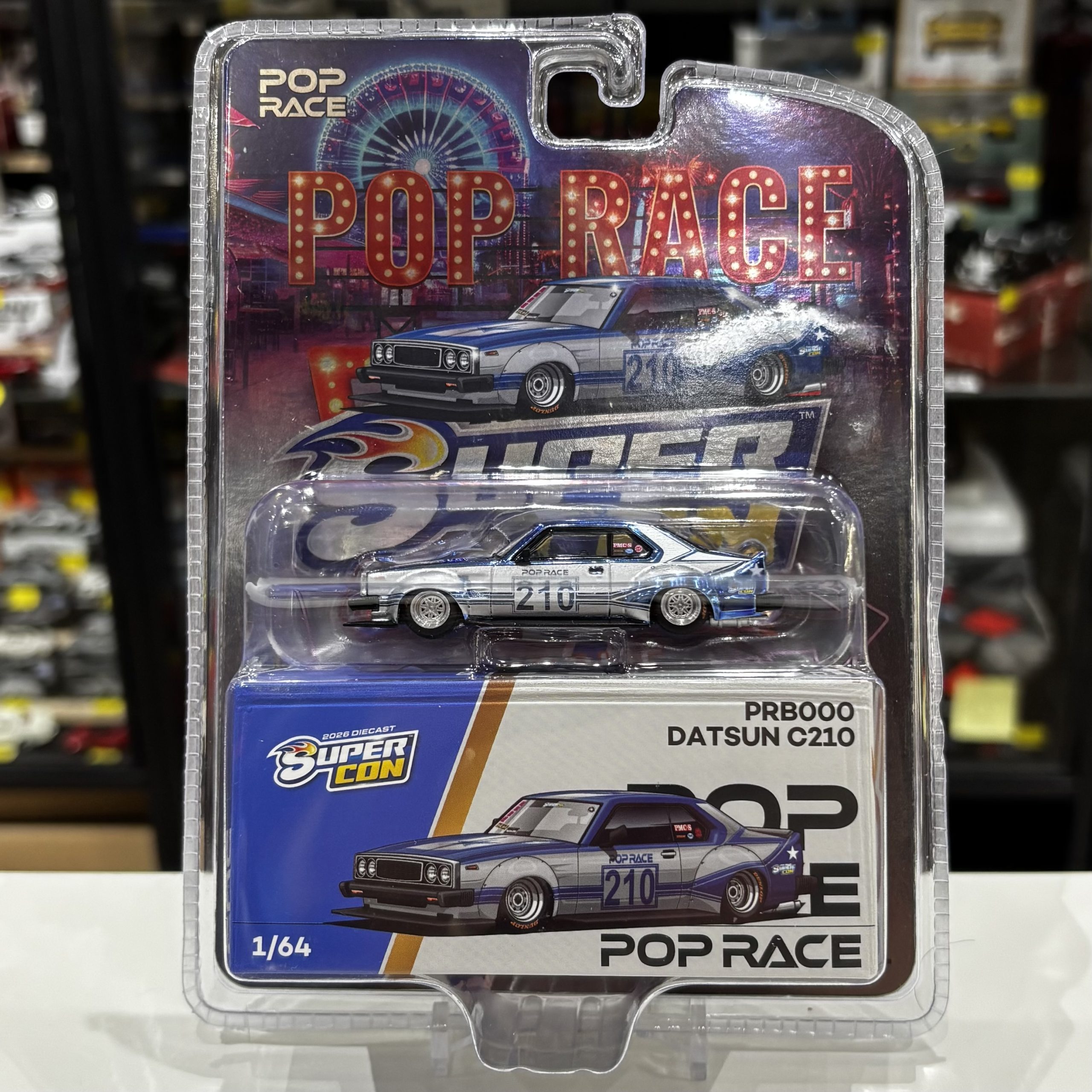 Pop Race PRB000 1:64 Datsun C210 chrome & blue Las Vegas Super Con