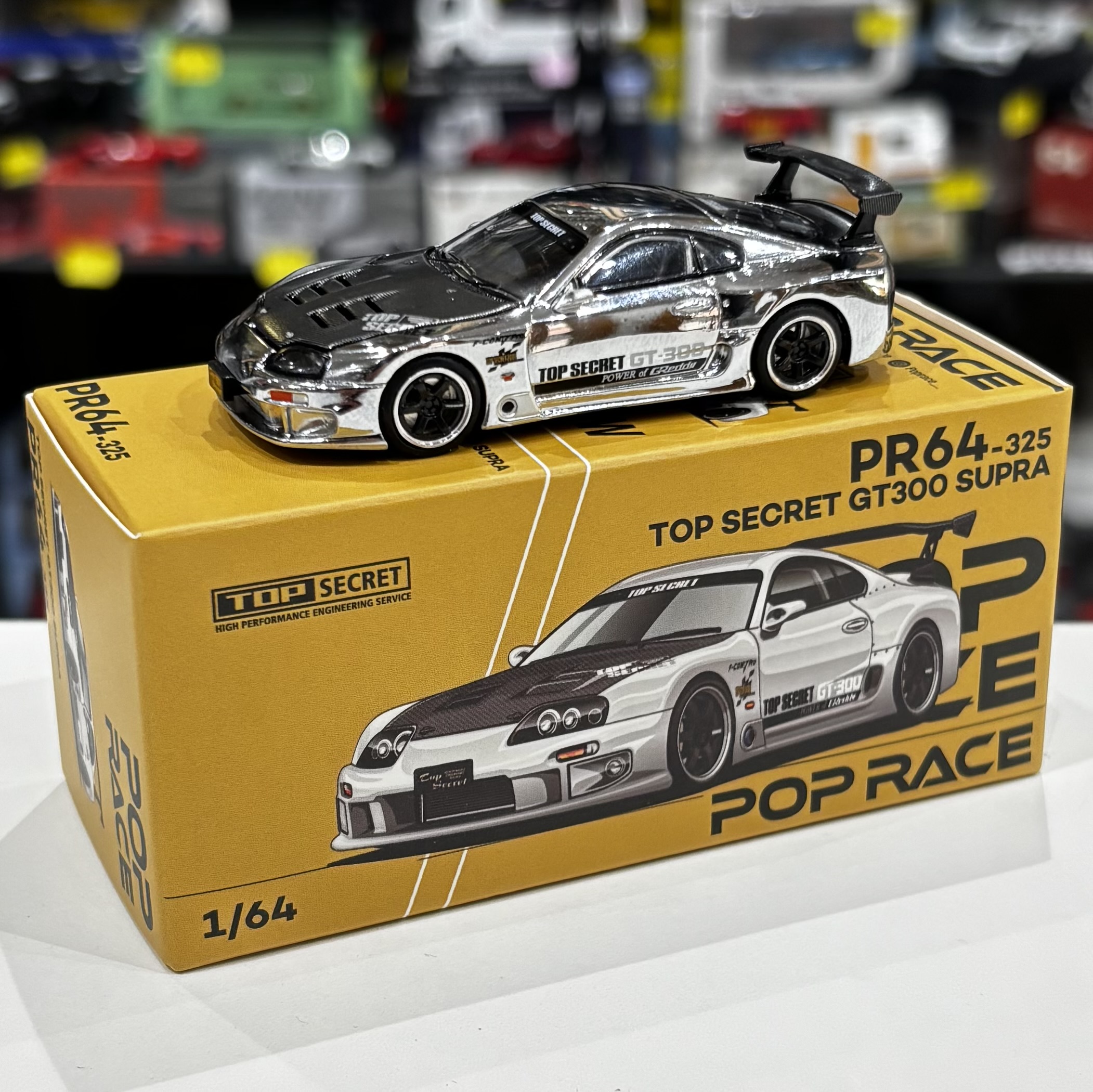 Pop Race PR640325 1:64 Top Secret GT300 Toyota Supra chrome & carbon